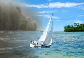 the wind blows our boat away from the islands